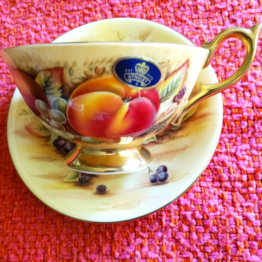 Prestine Aynsley Orchard Golden wide mounted cup and saucer w/ original sticker